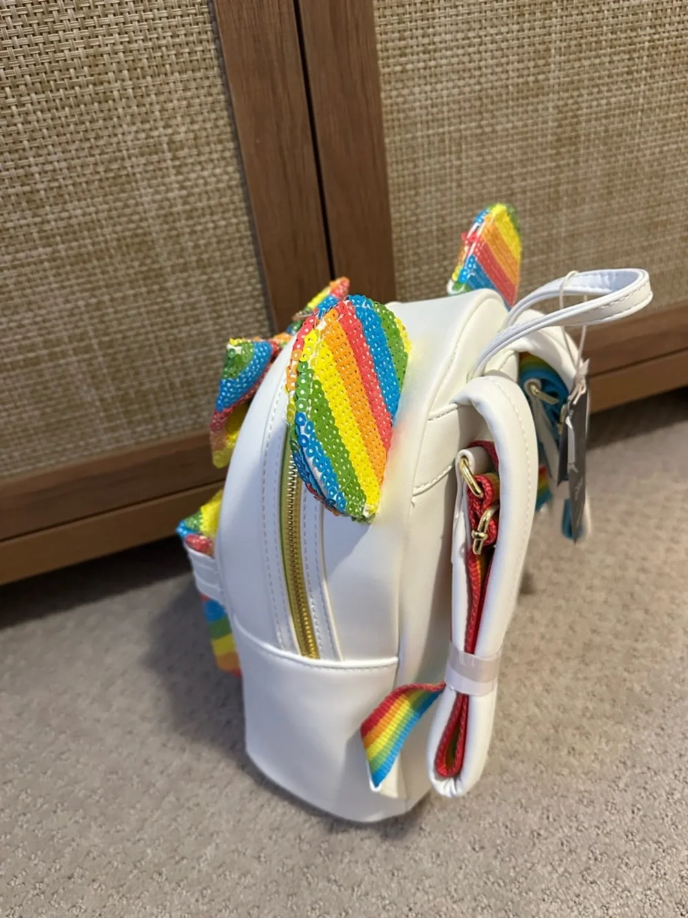 Loungefly White Mini Backpack with Rainbow Sequin Ears and Bow - Picture 2 of 3